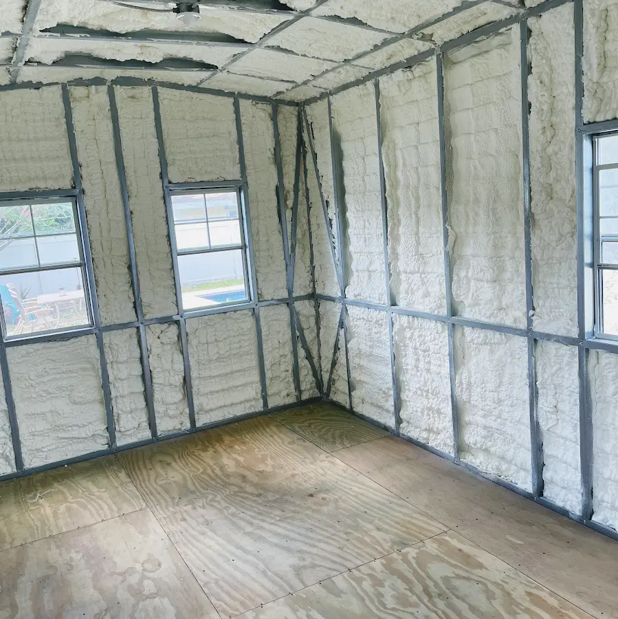 Closed-cell spray foam insulation applied to wall cavities in a residential project in Bemidji